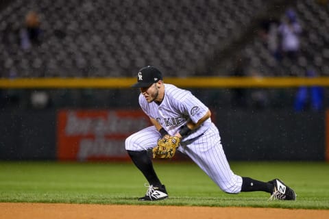 DENVER, CO – SEPTEMBER 24: Garrett Hampson #1 of the Colorado Rockies fields a ground ball for the final out of the game against the Philadelphia Phillies at Coors Field on September 24, 2018 in Denver, Colorado. (Photo by Dustin Bradford/Getty Images)