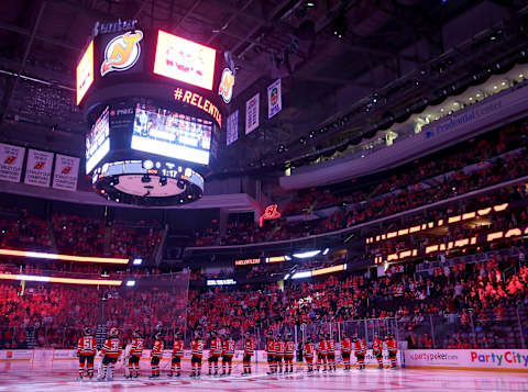 New Jersey Devils line up for player introductions. (Photo by Elsa/Getty Images)