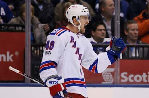 Jan 19, 2017; Toronto, Ontario, CAN; New York Rangers forward Michael Grabner (40) reacts after scoring a shorthanded goal against the Toronto Maple Leafs in the third period at the Air Canada Centre. New York defeated Toronto 5-2. Mandatory Credit: John E. Sokolowski-USA TODAY Sports