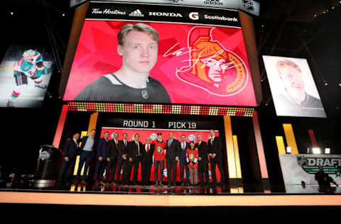 VANCOUVER, BRITISH COLUMBIA – JUNE 21: Lassi Thomson reacts after being selected nineteenth overall by the Ottawa Senators during the first round of the 2019 NHL Draft at Rogers Arena on June 21, 2019 in Vancouver, Canada. (Photo by Bruce Bennett/Getty Images)