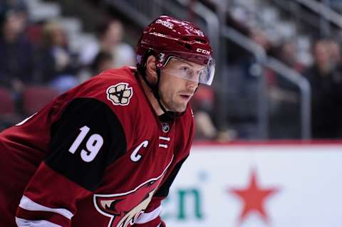 Oct 30, 2015; Glendale, AZ, USA; Arizona Coyotes right wing Shane Doan (19) looks on during the face off during the third period against the Vancouver Canucks at Gila River Arena. Mandatory Credit: Matt Kartozian-USA TODAY Sports