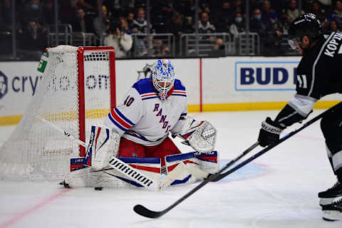 Jan 10, 2022; Los Angeles, California, USA; New York Rangers goaltender Alexandar Georgiev (40) blocks a shot against Los Angeles Kings center Anze Kopitar (11) during the second period at Crypto.com Arena. Mandatory Credit: Gary A. Vasquez-USA TODAY Sports