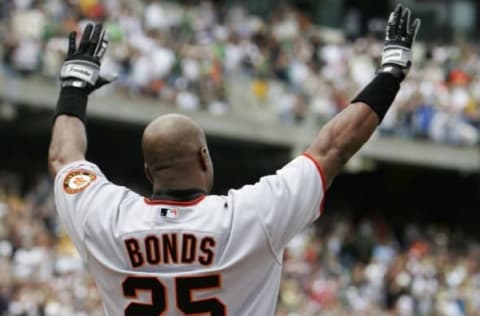 OAKLAND, CA – MAY 20: Barry Bonds #25 of San Francisco Giants celebrates after hitting his 714th career home run, tying Babe Ruth for second place on the all time home run list, during the second inning of the game against the Oakland Athletics on May 20, 2006 at McAfee Coliseum in Oakland, California. The Giants defeated the A’s 4-2. (Photo by Jed Jacobsohn/Getty Images)