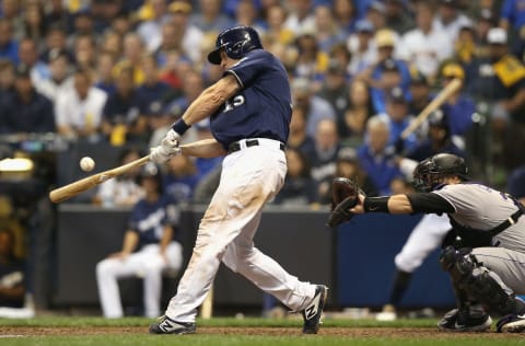 MILWAUKEE, WI – OCTOBER 05: Erik Krattz #15 of the Milwaukee Brewers hits a two-run RBI single during the eighth inning of Game Two of the National League Division Series against the Colorado Rockies at Miller Park on October 5, 2018 in Milwaukee, Wisconsin. (Photo by Dylan Buell/Getty Images)