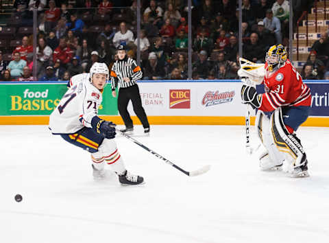 Jordan Kooy #31 of the Oshawa Generals clears the puck past Tyson Foerster #71 of the Barrie Colts (Photo by Chris Tanouye/Getty Images)