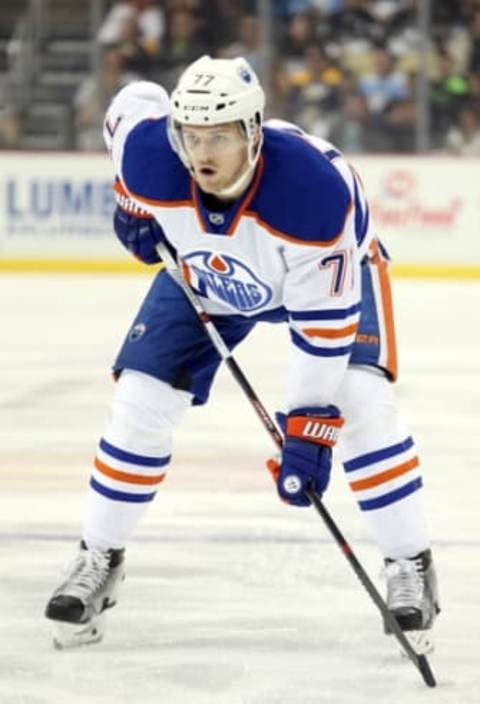 Nov 28, 2015; Pittsburgh, PA, USA; Edmonton Oilers defenseman Oscar Klefbom (77) at the face-off circle against the Pittsburgh Penguins during the first period at the CONSOL Energy Center. The Oilers won 3-2 in a shootout. Mandatory Credit: Charles LeClaire-USA TODAY Sports