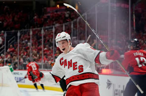 WASHINGTON, DC – OCTOBER 05: Jake Gardiner #51 of the Carolina Hurricanes celebrates after scoring the game winning goal in overtime against the Washington Capitals at Capital One Arena on October 5, 2019 in Washington, DC. (Photo by Patrick McDermott/NHLI via Getty Images)