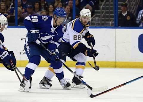 Feb 14, 2016; Tampa, FL, USA; St. Louis Blues defenseman Kevin Shattenkirk (22) defends Tampa Bay Lightning center Vladislav Namestnikov (90) during the second period at Amalie Arena. Mandatory Credit: Kim Klement-USA TODAY Sports