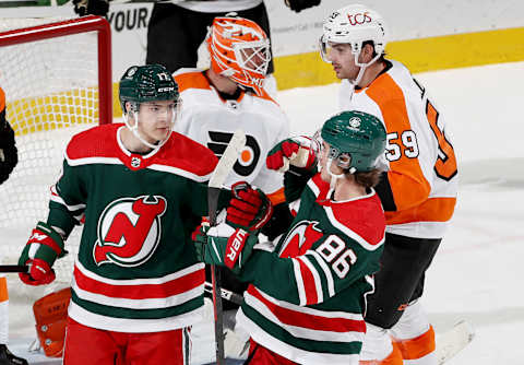 Yegor Sharangovich and Jack Hughes of the New Jersey Devils (Photo by Elsa/Getty Images)