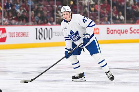 Sep 30, 2023; Montreal, Quebec, CAN; Toronto Maple Leafs defenseman Topi Niemela (47) plays the puck against the Montreal Canadiens during the first period at Bell Centre. Mandatory Credit: David Kirouac-USA TODAY Sports