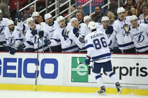 Nov 15, 2016; Detroit, MI, USA; Tampa Bay Lightning right wing Nikita Kucherov (86) celebrates the game winning goal with teammates during the third period against the Detroit Red Wings at Joe Louis Arena. Mandatory Credit: Tim Fuller-USA TODAY Sports