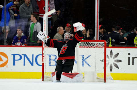 RALEIGH, NC – JANUARY 19: James Reimer #47 of the Carolina Hurricanes celebrates after a win in the shootout following an NHL game against he New York Islanders on January 19, 2020 at PNC Arena in Raleigh, North Carolina. (Photo by Gregg Forwerck/NHLI via Getty Images)