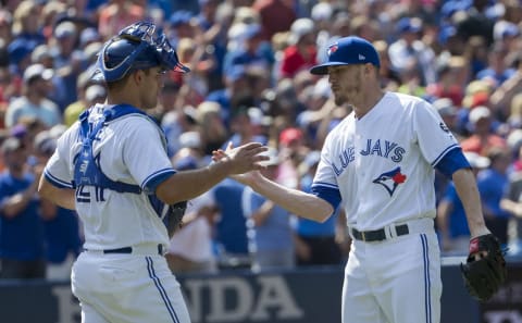 TORONTO, ON – AUGUST 12: Toronto Blue Jays relief pitcher Ken Giles (51) and Toronto Blue Jays catcher Luke Maile (21) following the win. Toronto Blue Jays Vs Tampa Bay Rays in MLB season play at Rogers Centre in Toronto. Jays win 2-1. Toronto Star/Rick Madonik (Rick Madonik/Toronto Star via Getty Images)