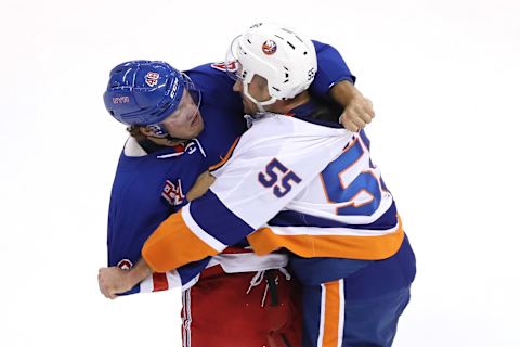 TORONTO, ONTARIO – JULY 29: Brendan Lemieux #48 of the New York Rangers and Johnny Boychuk #55 of the New York Islanders scuffle in the first period during an exhibition game prior to the 2020 NHL Stanley Cup Playoffs at Scotiabank Arena on July 29, 2020 in Toronto, Ontario. (Photo by Andre Ringuette/Freestyle Photo/Getty Images)