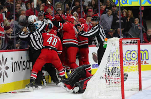 RALEIGH, NC – DECEMBER 05: Carolina Hurricanes fight San Jose Sharks during the 2nd period of the Carolina Hurricanes game versus the New York Rangers on December 5th, 2019 at PNC Arena in Raleigh, NC (Photo by Jaylynn Nash/Icon Sportswire via Getty Images)