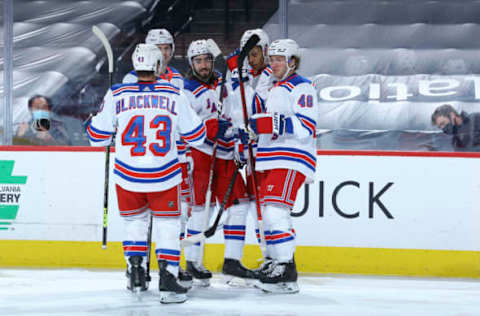 PHILADELPHIA, PA – MARCH 25: Colin Blackwell #43, Jacob Trouba #8, Mika Zibanejad #93, K’Andre Miller #79, and Brendan Lemieux #48 of the New York Rangers celebrate after a goal against the Philadelphia Flyers in the second period at the Wells Fargo Center on March 25, 2021 in Philadelphia, Pennsylvania. (Photo by Mitchell Leff/Getty Images)