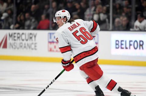 LOS ANGELES, CALIFORNIA – OCTOBER 15: Erik Haula #56 of the Carolina Hurricanes turns toward the play during a 2-0 Hurricanes win over the Los Angeles Kings at Staples Center on October 15, 2019 in Los Angeles, California. (Photo by Harry How/Getty Images)