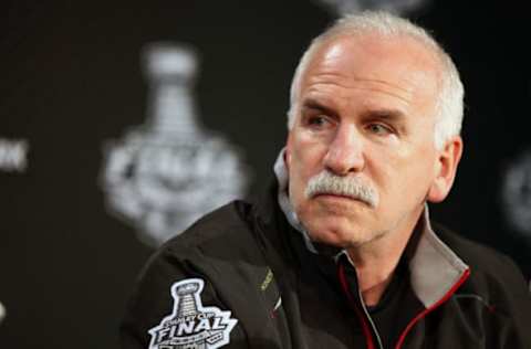 CHICAGO, IL- JUNE 11: Joel Quenneville head coach of the Chicago Blackhawks talks with reporters during the 2013 Stanley Cup Final Media Day at the United Center on June 11, 2013, in Chicago, Illinois. (Photo by Dave Sandford/NHLI via Getty Images)