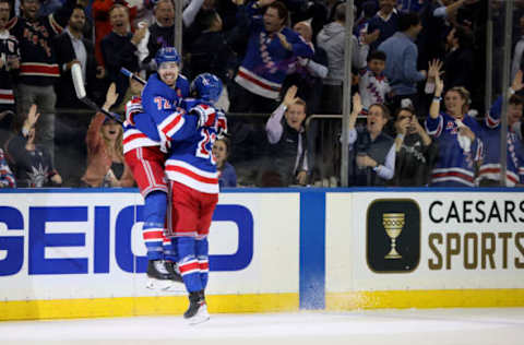 NEW YORK, NEW YORK – JUNE 01: Filip Chytil #72 of the New York Rangers celebrates with his teammate Alexis Lafreniere #13 after scoring his second goal on Andrei Vasilevskiy #88 of the Tampa Bay Lightning during the second period in Game One of the Eastern Conference Final of the 2022 Stanley Cup Playoffs at Madison Square Garden on June 01, 2022, in New York City. (Photo by Bruce Bennett/Getty Images)