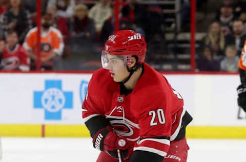 RALEIGH, NC – DECEMBER 31: Sebastian Aho #20 of the Carolina Hurricanes controls the puck on the ice during an NHL game against the Philadelphia Flyers on December 31, 2018 at PNC Arena in Raleigh, North Carolina. (Photo by Gregg Forwerck/NHLI via Getty Images)