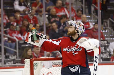 May 7, 2016; Washington, DC, USA; Washington Capitals goalie Braden Holtby (70) squirts water during a stoppage in play against the Pittsburgh Penguins in the second period in game five of the second round of the 2016 Stanley Cup Playoffs at Verizon Center. The Capitals won 3-1 as the Penguins lead the series 3-2. Mandatory Credit: Geoff Burke-USA TODAY Sports