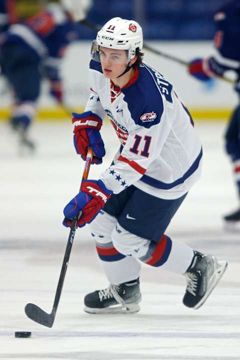 PLYMOUTH, MICHIGAN – JANUARY 16: Andrew Strathmann #11 warms up before the 2023 BioSteel All-American game at USA Hockey Arena on January 16, 2023 in Plymouth, Michigan. (Photo by Mike Mulholland/Getty Images)