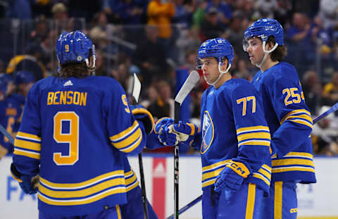 Oct 6, 2023; Buffalo, New York, USA; Buffalo Sabres right wing JJ Peterka (77) celebrates his goal with teammates during the second period against the Pittsburgh Penguins at KeyBank Center. Mandatory Credit: Timothy T. Ludwig-USA TODAY Sports