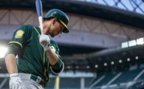 SEATTLE, WA – MAY 3: Stephen Piscotty #25 of the Oakland Athletics warms up before an at-bat in a game against the Seattle Mariners at Safeco Field on May 3, 2018 in Seattle, Washington. The Mariners won the game 4-1. (Photo by Stephen Brashear/Getty Images) *** Local Caption *** StephenPiscotty