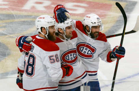 SUNRISE, FL – MARCH 29: Teammates congratulate Chris Wideman #20 of the Montreal Canadiens on scorimg a first-period goal against the Florida Panthers at the FLA Live Arena on March 29, 2022 in Sunrise, Florida. (Photo by Joel Auerbach/Getty Images)