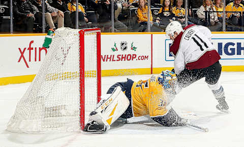 NASHVILLE, TN – NOVEMBER 27: Pekka Rinne #35 of the Nashville Predators makes the save against Matt Calvert #11 of the Colorado Avalanche at Bridgestone Arena on November 27, 2018, in Nashville, Tennessee. (Photo by John Russell/NHLI via Getty Images)