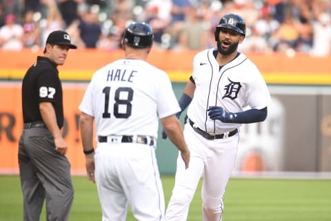 Jun 11, 2021; Detroit, Michigan, USA; Detroit Tigers right fielder Nomar Mazara (right) celebrates his home run with third base coach Chip Hale (18) during the second inning against the Chicago White Sox at Comerica Park. Mandatory Credit: Tim Fuller-USA TODAY Sports