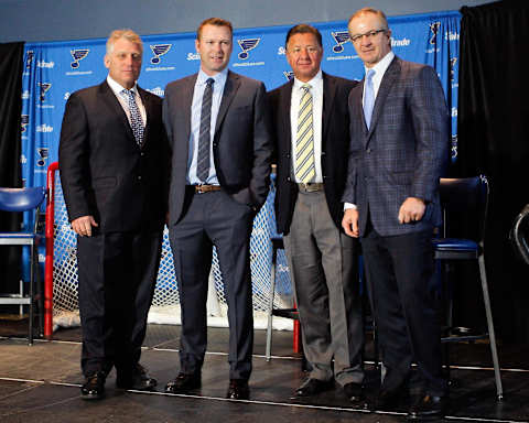 Jan 29, 2015; St. Louis, MO, USA; Former members of the Saint Louis Blues , from left to right Brett Hull , Martin Brodeur , Bernie Federko and Al MacInnis pose for the media after Brodeur announced his retirement from the NHL during a press conference at Scottrade Center. Mandatory Credit: Scott Kane-USA TODAY Sports