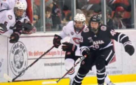 St. Cloud State’s Nick Poehling and Nebraska-Omaha’s Tyler Weiss chase a loose puck during the first period Saturday, Dec. 8, at the Herb Brooks National Hockey Center.Scsu Vs Nebraska Omaha Puk 19St. Cloud States Nick Poehling and Nebraska-Omaha’s Tyler Weiss chase a loose puck during the first period Saturday, Dec. 8, at the Herb Brooks National Hockey Center.