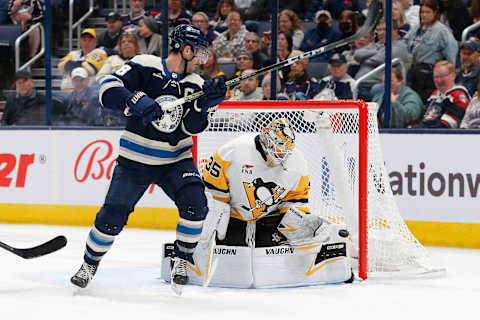 Nov 14, 2023; Columbus, Ohio, USA; Columbus Blue Jackets right wing Yegor Chinakhov’s (59) shot (not pictured) eludes Pittsburgh Penguins goalie Tristan Jarry (35) for a gaol during the first period at Nationwide Arena. Mandatory Credit: Russell LaBounty-USA TODAY Sports