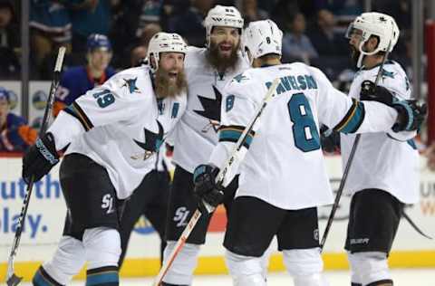 NHL Power Rankings: San Jose Sharks center Joe Pavelski (8) celebrates with teammates after scoring the game winning goal against the New York Islanders during the third period at Barclays Center. Mandatory Credit: Brad Penner-USA TODAY Sports