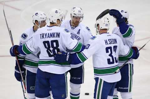 NHL Power Rankings: The Vancouver Canucks celebrate a goal by Vancouver Canucks center Henrik Sedin (33) during the third period at Prudential Center. The Devils defeated the Canucks 3-2. Mandatory Credit: Ed Mulholland-USA TODAY Sports