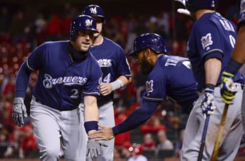 May 1, 2017; St. Louis, MO, USA; Milwaukee Brewers third baseman Travis Shaw (21) is congratulated by Eric Thames (7) after hitting a game winning three run home run off of St. Louis Cardinals relief pitcher Seung-Hwan Oh (not pictured) during the tenth inning at Busch Stadium. Mandatory Credit: Jeff Curry-USA TODAY Sports