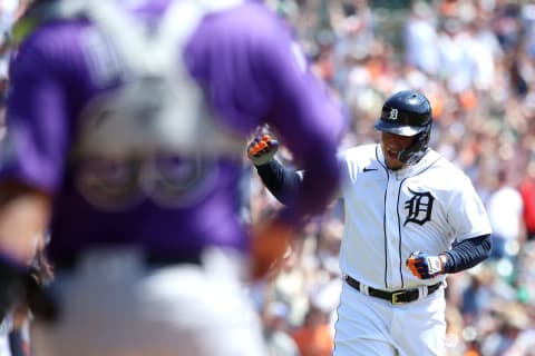 DETROIT, MICHIGAN – APRIL 23: Miguel Cabrera #24 of the Detroit Tigers celebrates his run in after a three run home run by teammate Spencer Torkelson #20 during the first inning of Game One of a doubleheader against the Colorado Rockies at Comerica Park on April 23, 2022 in Detroit, Michigan. (Photo by Katelyn Mulcahy/Getty Images)