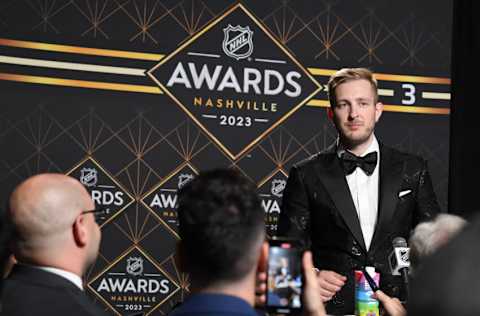 Jun 26, 2023; Nashville, Tennessee, USA; Boston Bruins goaltender Linus Ullmark talks with members of the media after winning the Vezina Trophy during the 2023 NHL Awards at Bridgestone Arena. Mandatory Credit: Christopher Hanewinckel-USA TODAY Sports