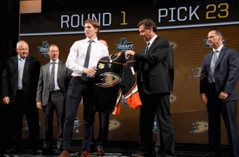 DALLAS, TX – JUNE 22: Isac Lundestrom receives his jersey onstage after being selected twenty-third overall by the Anaheim Ducks during the first round of the 2018 NHL Draft at American Airlines Center on June 22, 2018. (Photo by Brian Babineau/NHLI via Getty Images)