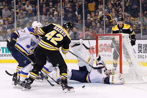 BOSTON, MA – FEBRUARY 01: Boston Bruins center David Backes (42) fans on a shot with St. Louis Blues goalie Jake Allen (34) down on the ice during a game between the Boston Bruins and the St. Louis Blues on February 1, 2018, at TD Garden in Boston, Massachusetts. The Bruins defeated the Blues 3-1. (Photo by Fred Kfoury III/Icon Sportswire via Getty Images)