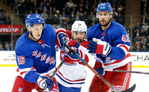 Ryan Strome #16 and Brendan Smith #42 of the New York Rangers