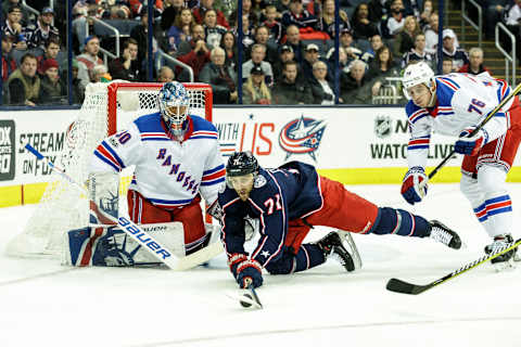 COLUMBUS, OH – NOVEMBER 17: Columbus Blue Jackets left wing Nick Foligno (71) dives for the puck during the first period in a game between the Columbus Blue Jackets and the New York Rangers on November 17, 2017, at Nationwide Arena in Columbus, OH. (Photo by Adam Lacy/Icon Sportswire via Getty Images)