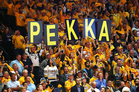 Fans hold up signs spelling “PEKKA” cheering on their goalie Pekka Rinne #35 of the Nashville Predators (not pictured) (Photo by Frederick Breedon/Getty Images)