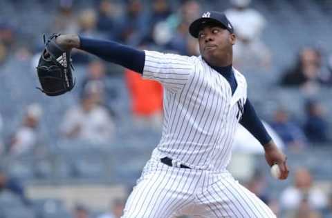 Apr 30, 2017; Bronx, NY, USA; New York Yankees relief pitcher Aroldis Chapman (54) pitches against the Baltimore Orioles during the tenth inning at Yankee Stadium. Mandatory Credit: Brad Penner-USA TODAY Sports