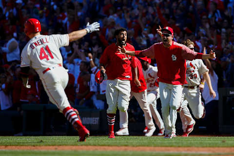 ST. LOUIS, MO – SEPTEMBER 22: Austin Gomber #68 and Jose Martinez #38 of the St. Louis Cardinals rush the field to celebrate after Tyler O’Neill #41 of the St. Louis Cardinals hit a walk-off home run against the San Francisco Giants in the tenth inning at Busch Stadium on September 22, 2018 in St. Louis, Missouri. (Photo by Dilip Vishwanat/Getty Images)