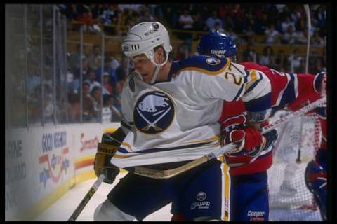 8 May 1993: Leftwinger Brad May of the Buffalo Sabres works against the Montreal Canadiens during a game at Memorial Auditorium in Buffalo, New York. Mandatory Credit: Rick Stewart /Allsport