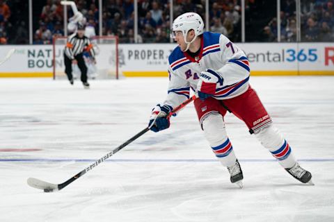 UNIONDALE, NY – JANUARY 16: New York Rangers Defenceman Tony DeAngelo (77) skates with the puck on a break away and scores a goal during the third period of the National Hockey League game between the New York Rangers and the New York Islanders on January 16, 2020, at the Nassau Veterans Memorial Coliseum in Uniondale, NY. (Photo by Gregory Fisher/Icon Sportswire via Getty Images)