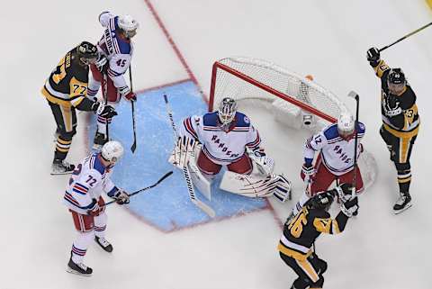 PITTSBURGH, PA – MAY 07: Brock McGinn #23 of the Pittsburgh Penguins reacts after scoring a goal against Igor Shesterkin #31 of the New York Rangers during the first period in Game Three of the First Round of the 2022 Stanley Cup Playoffs at PPG PAINTS Arena on May 7, 2022 in Pittsburgh, Pennsylvania. (Photo by Justin Berl/Getty Images)