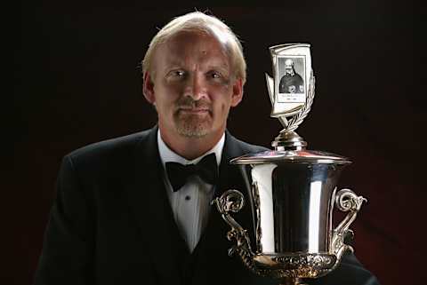 Head coach Lindy Ruff poses with the Jack Adams Award (Photo by Harry How/Getty Images for NHL)